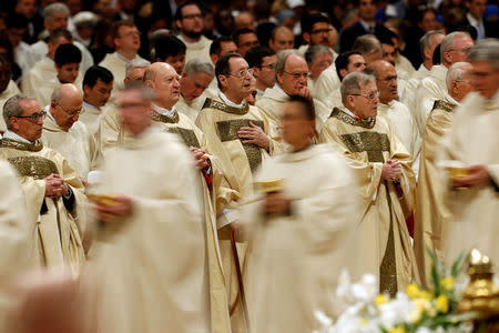 Cardinals attend the Easter vigil Mass in Saint Peter's Basilica at the Vatican, April 20, 2019. REUTERS/Remo Casilli