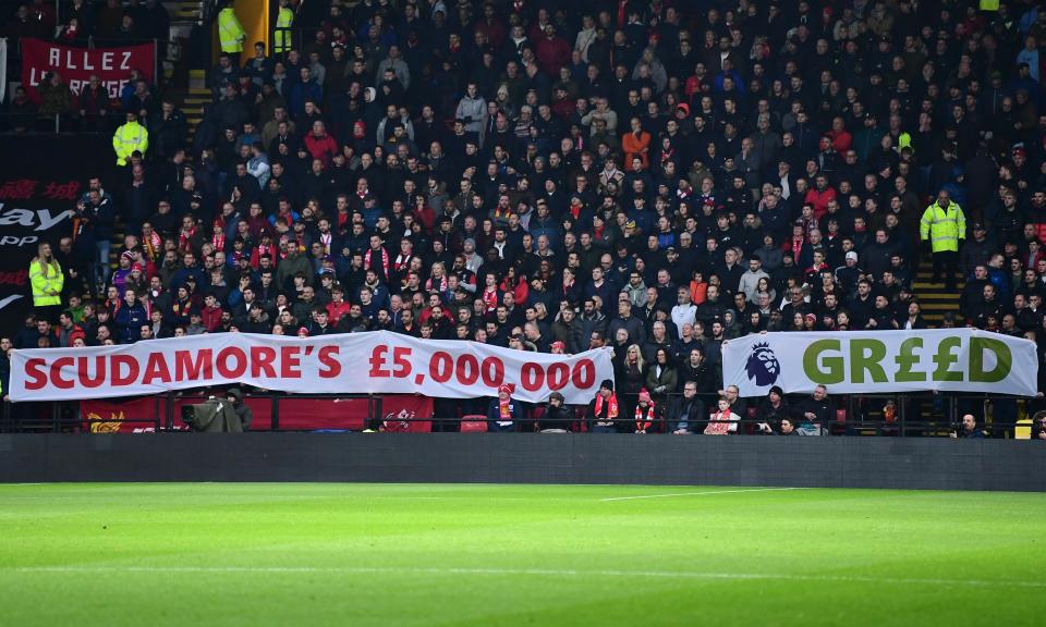 Fans in the Liverpool away section let Richard Scudamore and the Premier League know how they feel about the retiring chief executive’s £5m retirement bonus, paid for by the clubs.