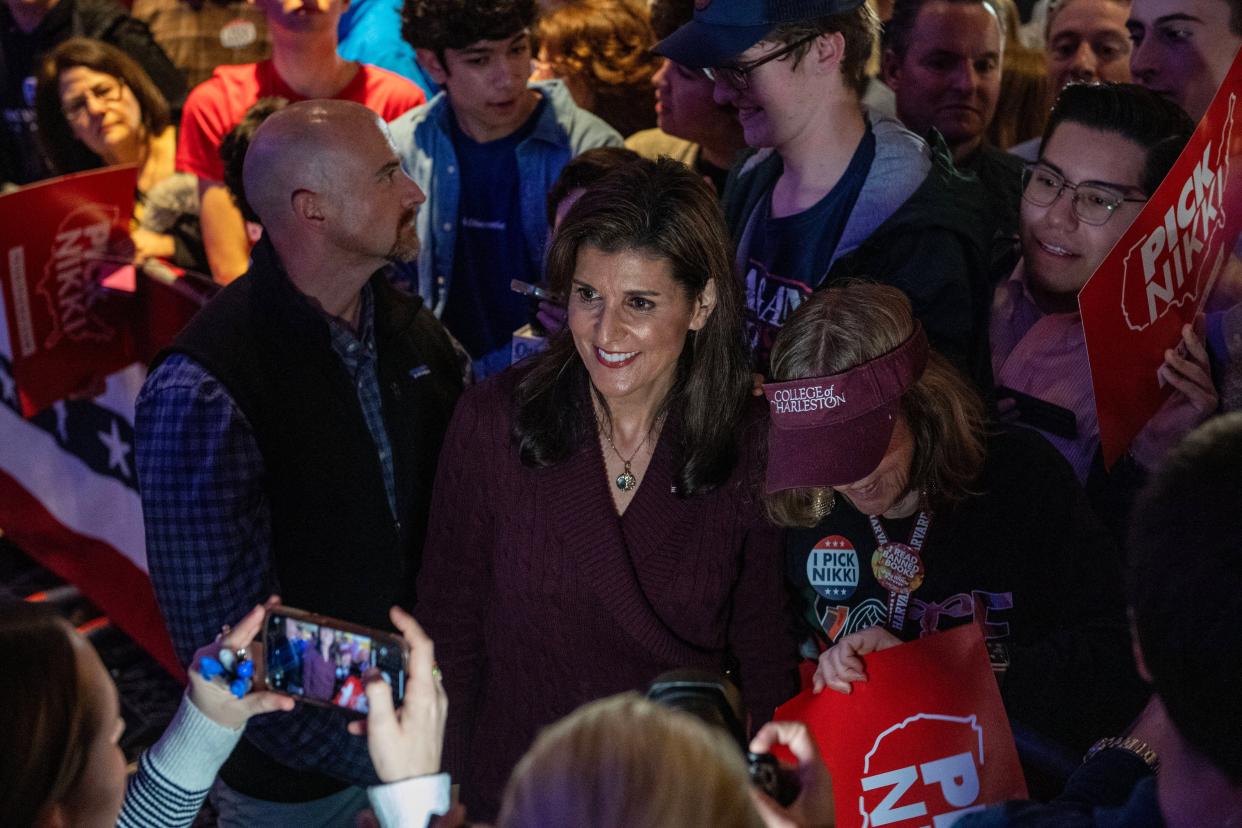 US Republican presidential hopeful and former UN Ambassador Nikki Haley takes pictures with supporters during a campaign rally in Needham, Massachusetts, on March 2, 2024 (AFP via Getty Images)