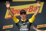 Cycling - Tour de France - The 181-km Stage 8 from Dreux to Amiens Metropole - July 14, 2018 - LottoNL-Jumbo rider Dylan Groenewegen of the Netherlands celebrates his stage win. REUTERS/Stephane Mahe