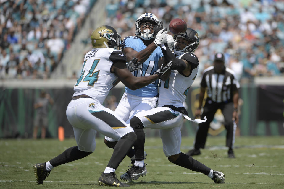 Jacksonville Jaguars outside linebacker Myles Jack (44) and cornerback A.J. Bouye (21) break up a pass. (AP)