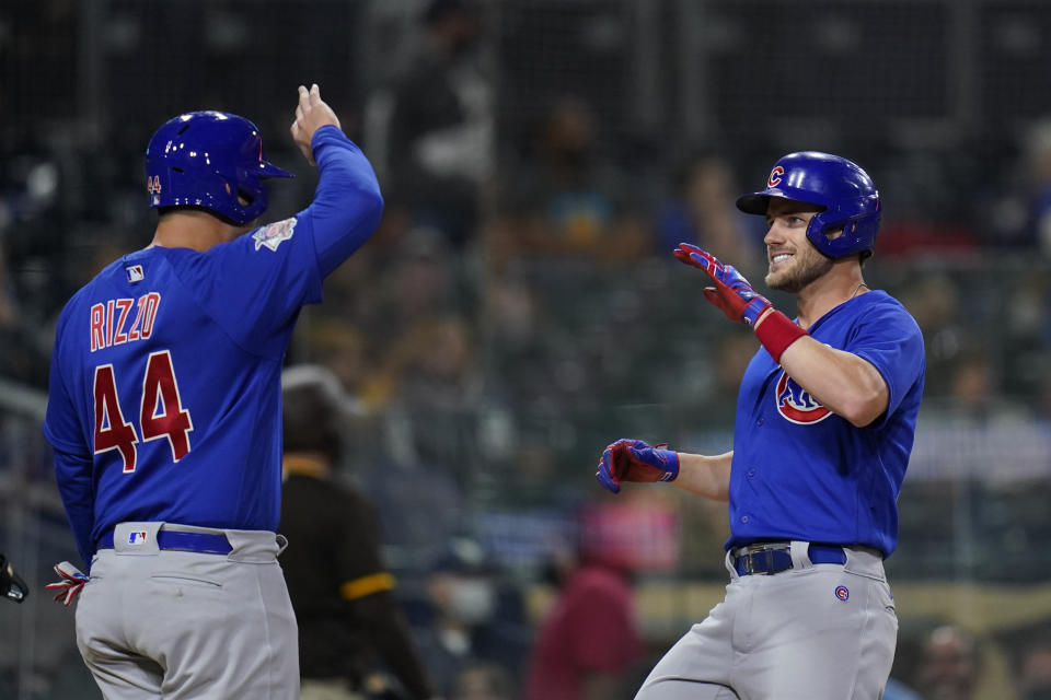 Chicago Cubs' Patrick Wisdom, right, celebrates with Anthony Rizzo after hitting a two-run home run during the sixth inning of the team's baseball game against the San Diego Padres, Tuesday, June 8, 2021, in San Diego. (AP Photo/Gregory Bull)