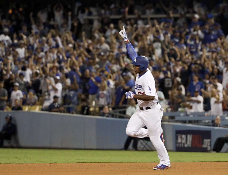 Dodgers slugger Yasiel Puig celebrates his home run against the Cubs during Game 1 of the NLCS. (AP)