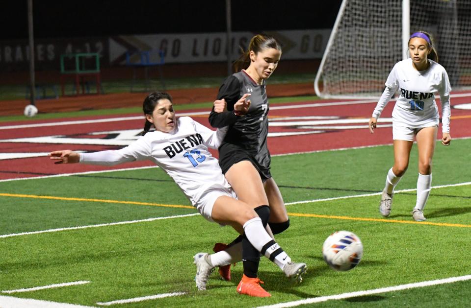 Buena's Kimberly Chavarria (left) tries to knock the ball away from Oaks Christian's Charlotte Ward during a nonleague match on Friday, Jan. 5, 2024. Oaks Christian won 2-0.