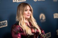<p>Before Hilary Duff recently debuted her <a href="https://www.goodhousekeeping.com/life/entertainment/a29849227/hilary-duff-lizzie-mcguire-bangs-photos/" rel="nofollow noopener" target="_blank" data-ylk="slk:new bangs for the Lizzie McGuire reboot;elm:context_link;itc:0;sec:content-canvas" class="link ">new bangs for the Lizzie McGuire reboot</a>, she rocked a set of long, center-parted bangs swept to both sides — an easy look for a cool '70s vibe.</p>