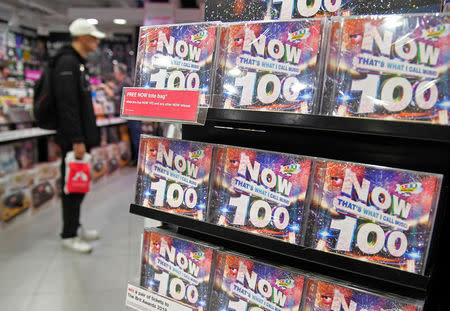 A shopper browses record albums at an HMV music store in London, Britain, July 20, 2018. REUTERS/Toby Melville