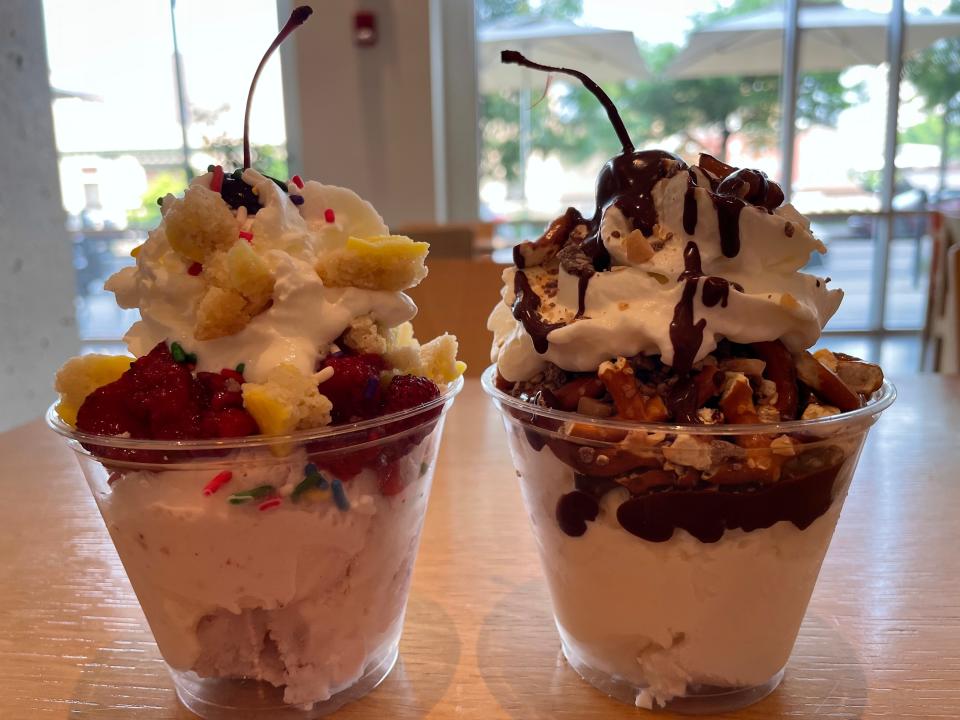 Bubbles and Cream at Marble City Market features around eight different flavors. Pictured left: Peggy & Clyde sundae, made with strawberry ice cream, caramel, fresh strawberries, lemon cookie bits, whipped cream, sprinkles and a cherry. Right:  The Locomotive. Butter pecan ice cream coated with a chocolate shell and other sweet toppings.