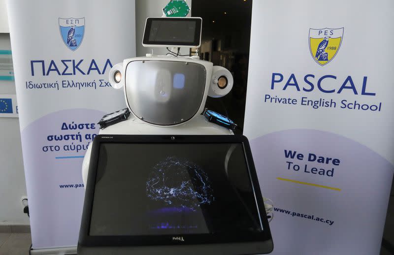 "Alnstein", a robot powered with ChatGPT, is seen at Pascal school in Nicosia