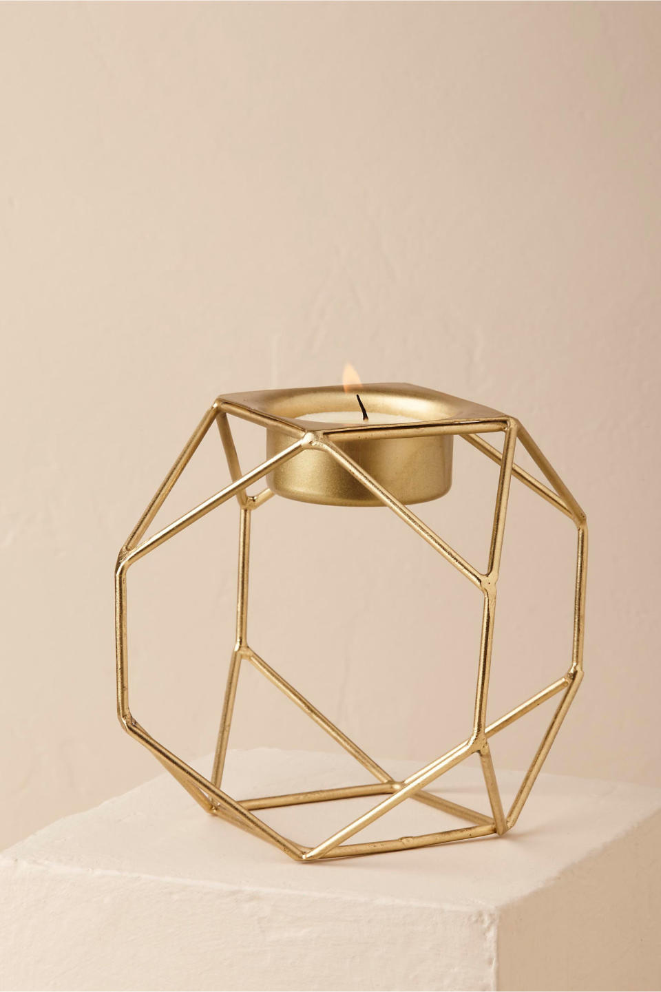 Even though fluid bohemian is trending, that doesn't mean sharp lines and three-dimensional shapes are out of style. Geometric details can easily be found in a wide range&nbsp;of wedding details including wedding stationery, backdrops, <a href="https://www.worldmarket.com/product/antique-brass-hexagonal-lantern.do?sortby=ourPicks&amp;from=fn" target="_blank">hanging lanterns</a> or <a href="https://www.bhldn.com/shop-decor-centerpieces/geo-tea-light-holder-gold/productoptionids/d6588c0c-04f9-46b0-b5da-0086a7a09584" target="_blank">votives</a>, signage, terrariums, and wedding cake tier shapes and d&eacute;cor.