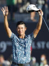 United States' Collin Morikawa celebrates on the 18th green after winning the British Open Golf Championship at Royal St George's golf course Sandwich, England, Sunday, July 18, 2021. (AP Photo/Peter Morrison)