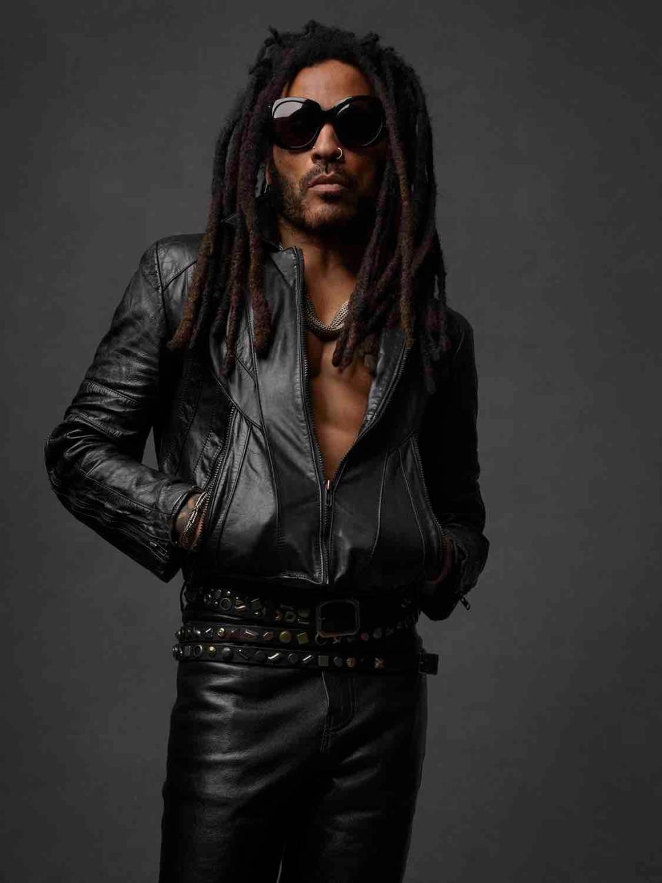 Lenny Kravitz, 59, is serious about his workout, and is stylish while doing it in black leather pants and a mesh top.