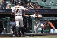 San Francisco Giants' Evan Longoria (10) is congratulated by manager Gabe Kapler after hitting a three-run home run during the first inning of a baseball game against the New York Mets in San Francisco, Wednesday, May 25, 2022. (AP Photo/Jeff Chiu)