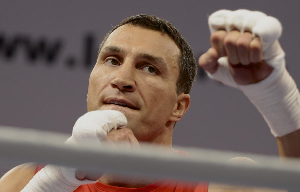 FILE - This is a Wednesday, Oct. 2, 2013 file photo of boxer Wladimir Klitschko of Ukraine attends an open training session in Moscow, Russia.Wladimir Klitschko will defend his WBA, IBF, WBO and IBO heavyweight titles against Australian challenger Alex Leapai in Oberhausen, Germany, on April 26. (AP Photo/Ivan Sekretarev, File)