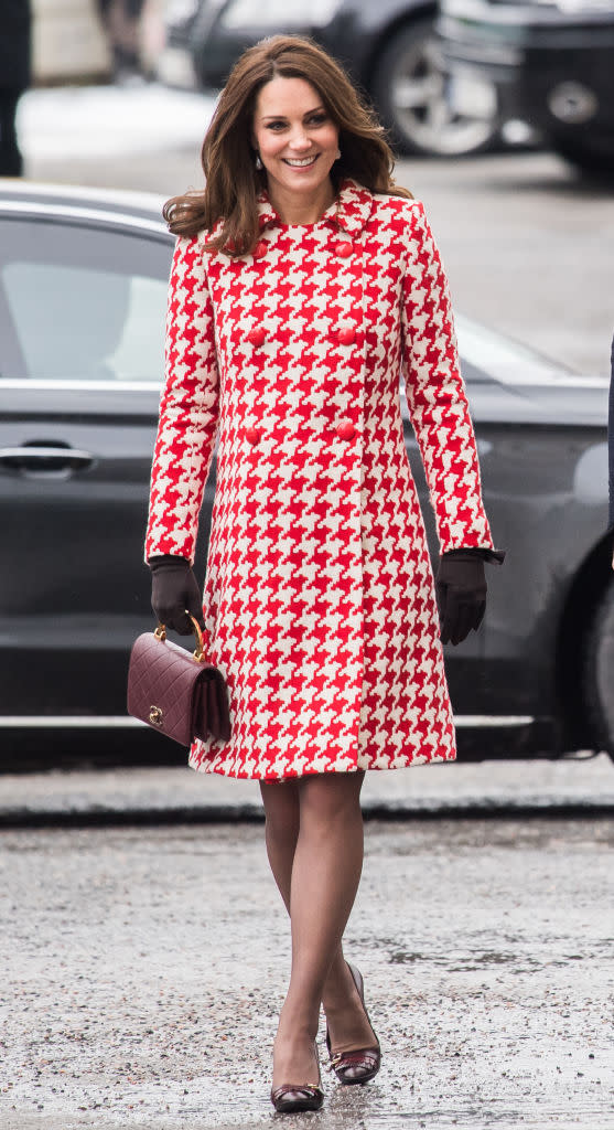 <p>The Duchess dressed her bump in one of her chicest looks to date to visit Matteusskolan School in Sweden on January 31, 2018. She teamed a houndstooth coat with a Chanel handbag and co-ordinating shoes. <em>[Photo: Getty]</em> </p>