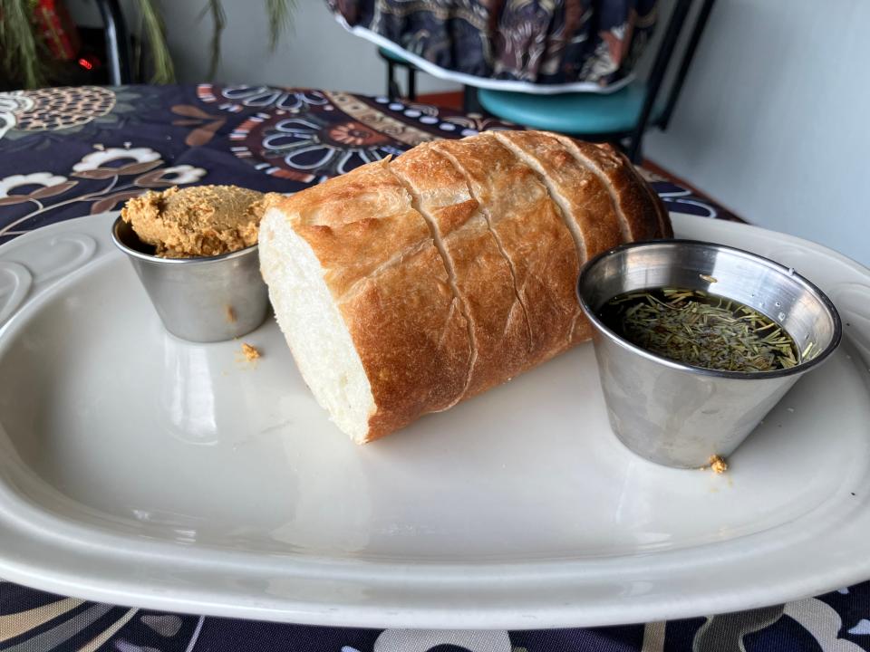 Veg+ serves house-made bread alongside whipped pumpkin maple butter and roasted garlic herb oil for dipping.