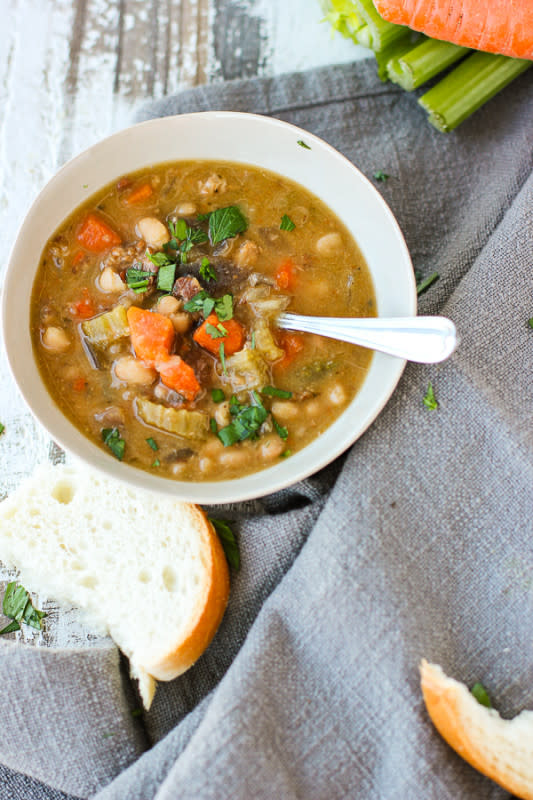 <p>Lisa's Dinnertime Dish</p><p>This slow cooker bean with bacon soup is a big bowl of comfort that takes almost no effort. </p><p><strong>Get the recipe: <a href="https://lisasdinnertimedish.com/slow-cooker-bean-with-bacon-soup/" rel="nofollow noopener" target="_blank" data-ylk="slk:Bean with Bacon Soup;elm:context_link;itc:0;sec:content-canvas" class="link ">Bean with Bacon Soup</a></strong></p>