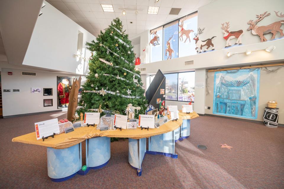 Guests can make their way through the Holiday Walk of Fame as part of the "Lights, Camera, Christmas: The Art of Visual Storytelling" exhibit in the Buell Childrens Museum.