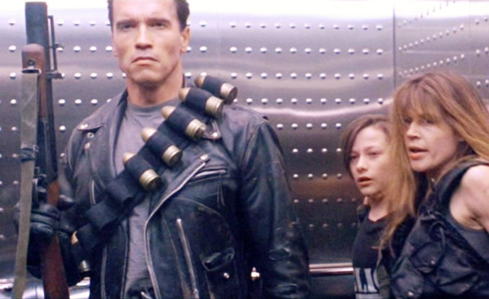 The movie "Terminator 2: Judgment Day", (alt: T2) directed by James Cameron. Seen here from left, Arnold Schwarzenegger (as the T-800 Terminator), Edward Furlong (as John Connor) and Linda Hamilton (as Sarah Connor).