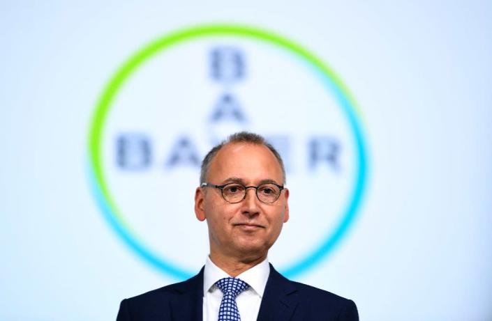 Bayer CEO Werner Baumann faced down disgruntled shareholders in Bonn on Friday, saying the business case for the Monsanto merger remained as strong as ever (AFP Photo/INA FASSBENDER)