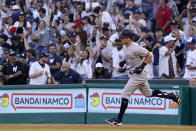 New York Yankees' Andrew Benintendi rounds first after hitting a solo home run during the first inning of a baseball game against the Los Angeles Angels Tuesday, Aug. 30, 2022, in Anaheim, Calif. (AP Photo/Mark J. Terrill)