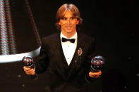 Soccer Football - The Best FIFA Football Awards - Royal Festival Hall, London, Britain - September 24, 2018 Luka Modric poses with his awards Action Images via Reuters/John Sibley