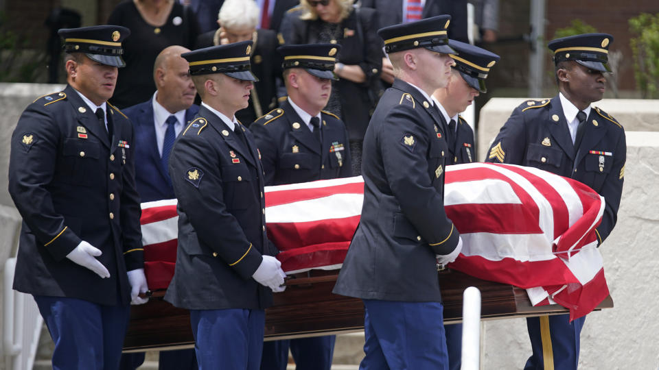 Members of the Utah Army National Guard carry the casket of former Utah Sen. Orrin Hatch during funeral services at The Church of Jesus Christ of Latter-day Saints' Institute of Religion Friday, May 6, 2022, in Salt Lake City. Hatch, the longest-serving Republican senator in history and a fixture in Utah politics for more than four decades, died last month at the age of 88. (AP Photo/Rick Bowmer)