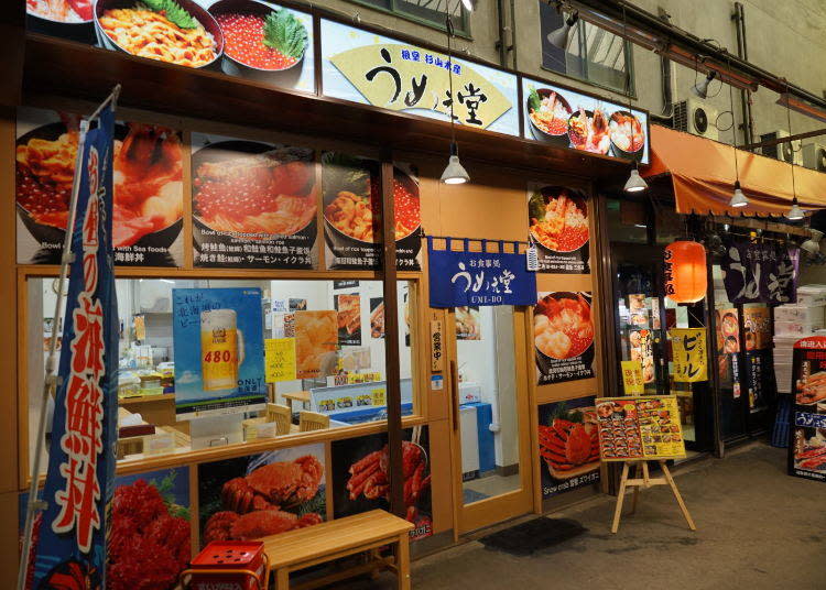 Photos of the delicious bowl dishes line the front of the shop