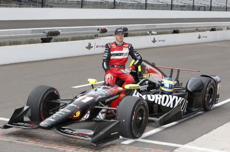 May 21, 2016; Indianapolis, IN, USA; Verizon Indy Car driver Sebastien Bourdais poses for the traditional photo at the yard of bricks after qualifying for the Indianapolis 500 at Indianapolis Motor Speedway. Brian Spurlock-USA TODAY Sports - RTSFC3C
