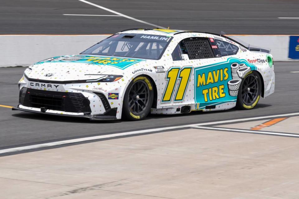 May 18, 2024; North Wilkesboro, North Carolina, USA; NASCAR Cup Series driver Denny Hamlin (11) during qualifying at North Wilkesboro Speedway.