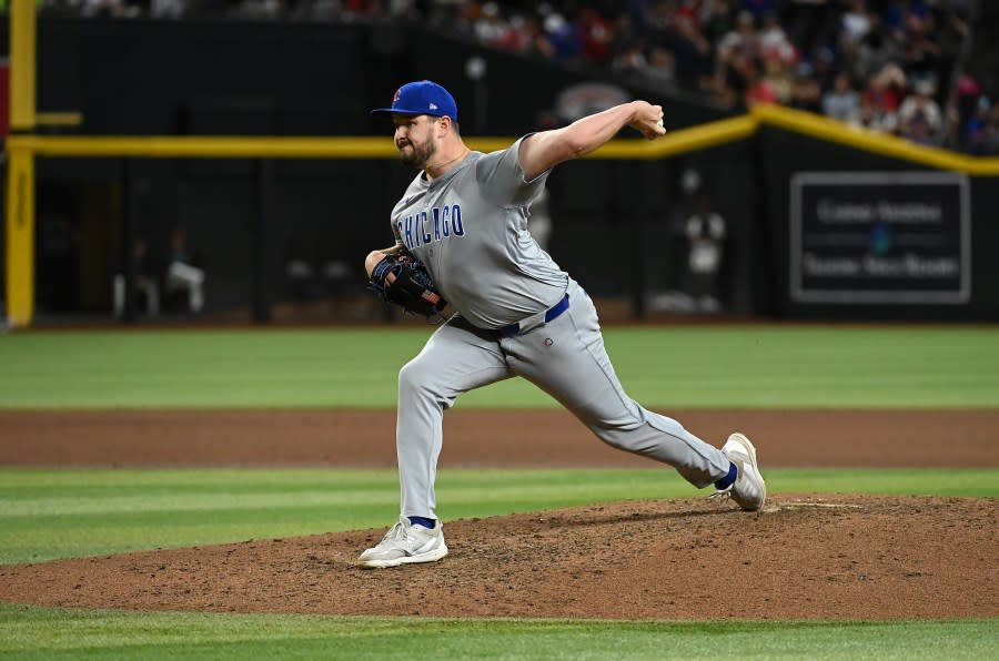 PHOENIX, ARIZONA – APRIL 15: Luke Little #42 of the Chicago Cubs delivers a pitch against the <a class="link " href="https://sports.yahoo.com/mlb/teams/arizona/" data-i13n="sec:content-canvas;subsec:anchor_text;elm:context_link" data-ylk="slk:Arizona Diamondbacks;sec:content-canvas;subsec:anchor_text;elm:context_link;itc:0">Arizona Diamondbacks</a> at Chase Field on April 15, 2024 in Phoenix, Arizona. All players are wearing the number 42 in honor of Jackie Robinson Day. (Photo by Norm Hall/Getty Images)