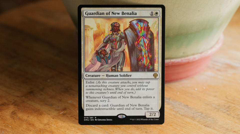 Card featuring Guardian of New Benalia from Dominariu United on a flat surface.