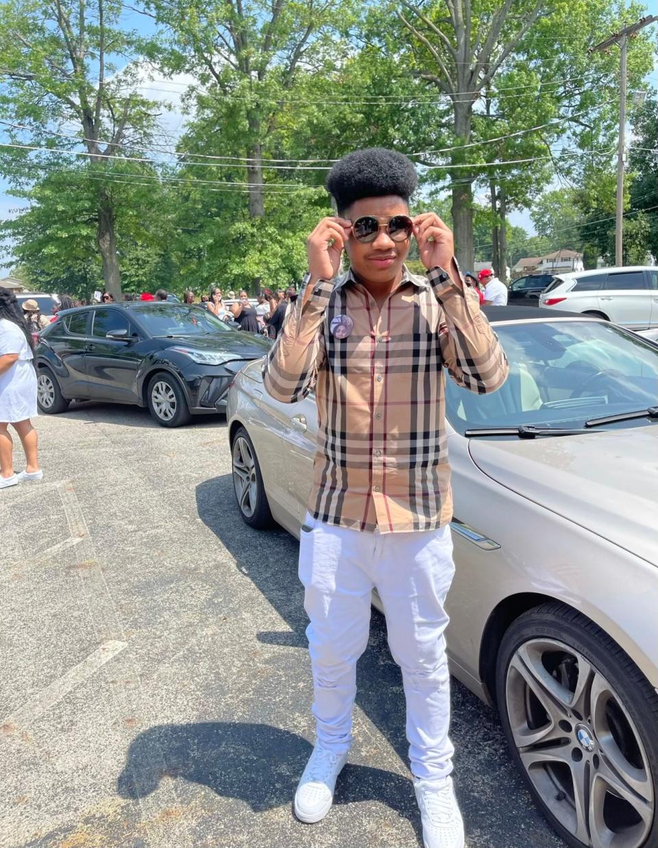 Ra'Shawyn Carter Jr., is pictured here in July 2021 at the funeral of his stepfather, Gavin Lane, who was killed in a drive-by shooting.  Carter, 15, was fatally shot Sunday, Aug. 27, 2023, in an outside area at Easton Town Center.