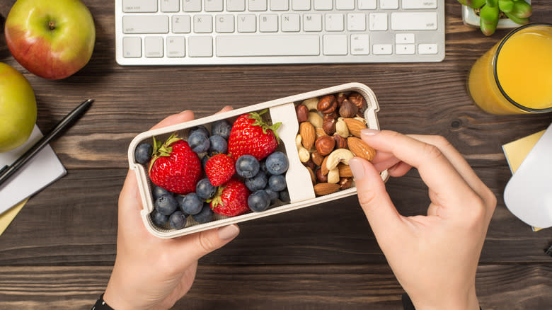 snack box and fruit while working