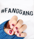 Consider this interpretation way cooler than the cheap plastic fangs at the Halloween store. Make like nail artist Hang Nguyen with <a href="https://www.amazon.com/OPI-Nail-Lacquer-Coca-Cola-Red/dp/B000NG90NE" rel="nofollow noopener" target="_blank" data-ylk="slk:OPI's Coca Cola Red;elm:context_link;itc:0;sec:content-canvas" class="link ">OPI's Coca Cola Red</a>, <a href="https://www.amazon.com/OPI-Nail-Lacquer-Black-Onyx/dp/B000NG4778" rel="nofollow noopener" target="_blank" data-ylk="slk:Black Onyx;elm:context_link;itc:0;sec:content-canvas" class="link ">Black Onyx</a>, and <a href="https://www.amazon.com/OPI-Nail-Lacquer-Alpine-Snow/dp/B002D4DQ1Q" rel="nofollow noopener" target="_blank" data-ylk="slk:Alpine Snow;elm:context_link;itc:0;sec:content-canvas" class="link ">Alpine Snow</a>.