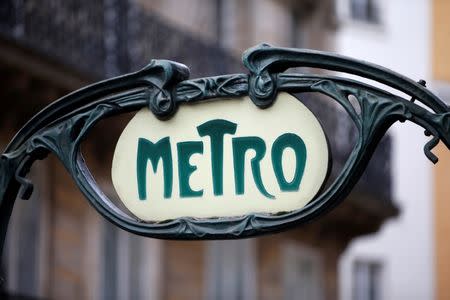 FILE PHOTO: A Metro sign is seen at Reaumur Sebastopol station in Paris, France, January 25, 2016. The entrance to this metro was designed by Frenchmen Hector Guimard in the 'Art Nouveau' (New Art) style. Picture taken January 25, 2016. REUTERS/Charles Platiau/File Photo