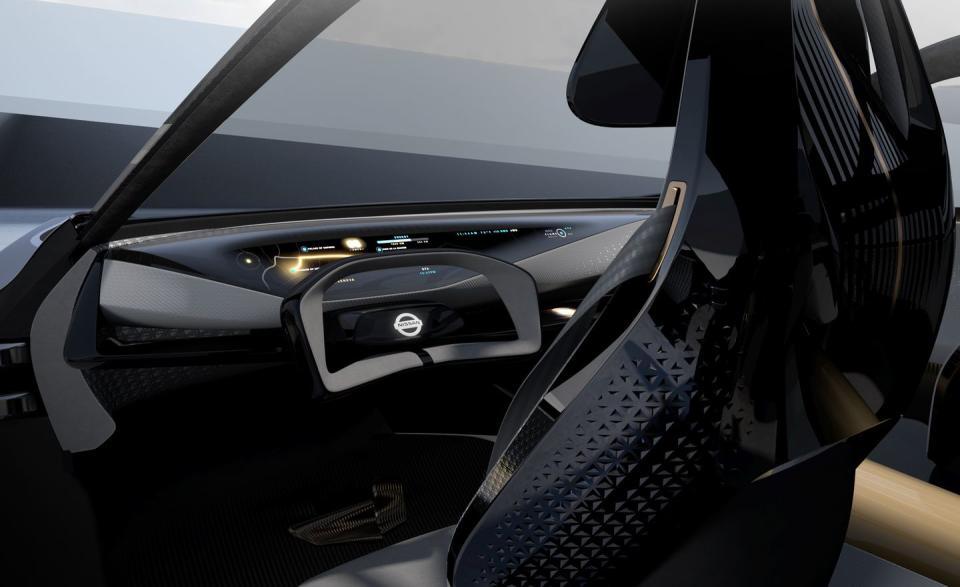 <p>The wild-looking steering wheel appears to float separately from the dashboard and has paddle shifters built into the back of it.</p>