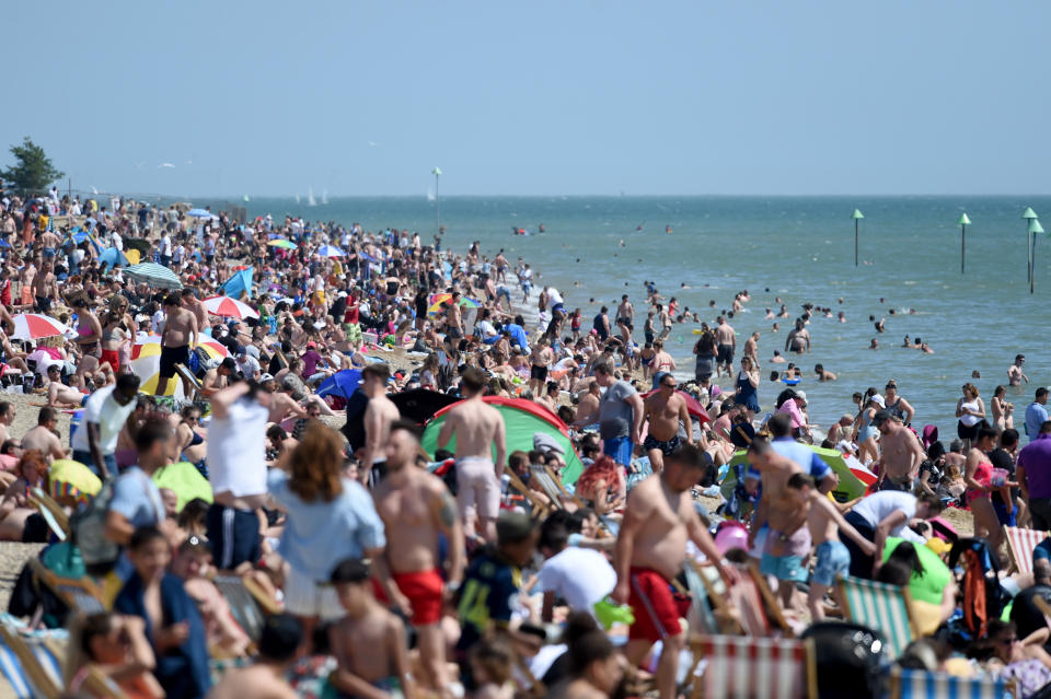 SOUTHEND-ON-SEA, UNITED KINGDOM - MAY 25: People are seen on the beach amid coronavirus (Co-vid 19) pandemic on May 25, 2020 in Southend-On-Sea, United Kingdom. (Photo by Kate Green/Anadolu Agency via Getty Images)