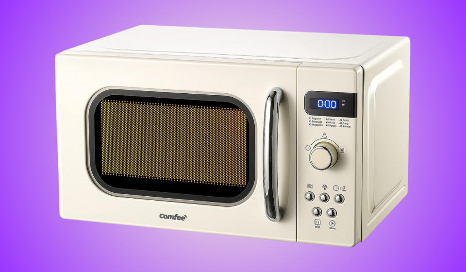 the comfee retro-inspired microwave in a cream color