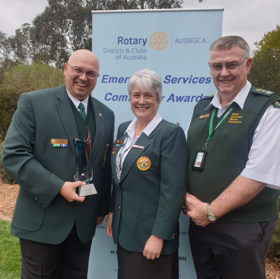 Paul Marshall, Captain of the Albury and Border Rescue Squad in Albury, NSW, accepts volunteer of the year award in Canberra.