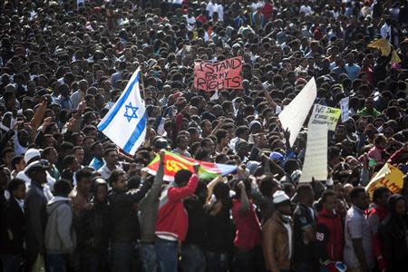 African migrants take part in a protest at Rabin Square in Tel Aviv January 5, 2014. REUTERS/Nir Elias