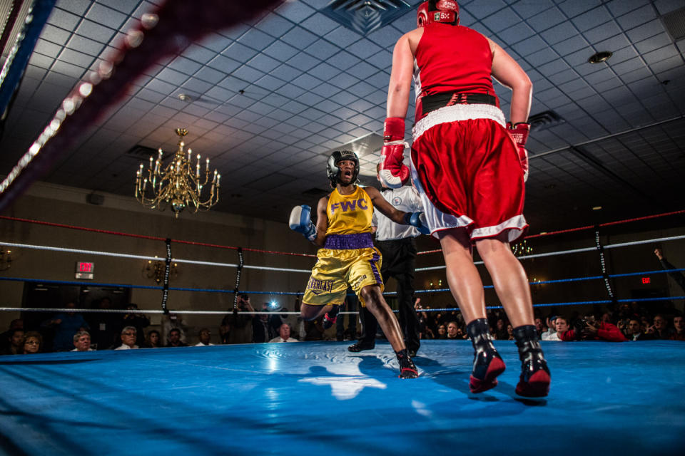 <p>Claressa “T-Rex” Shields fights against former Canadian Champion Mary Spencer at a showfight in Lansing, Mich., Feb. 2013. This is 6 months after she won the Gold Medal in Woman’s Boxing at the 2012 Olympics in London. (Photograph by Zackary Canepari) </p>
