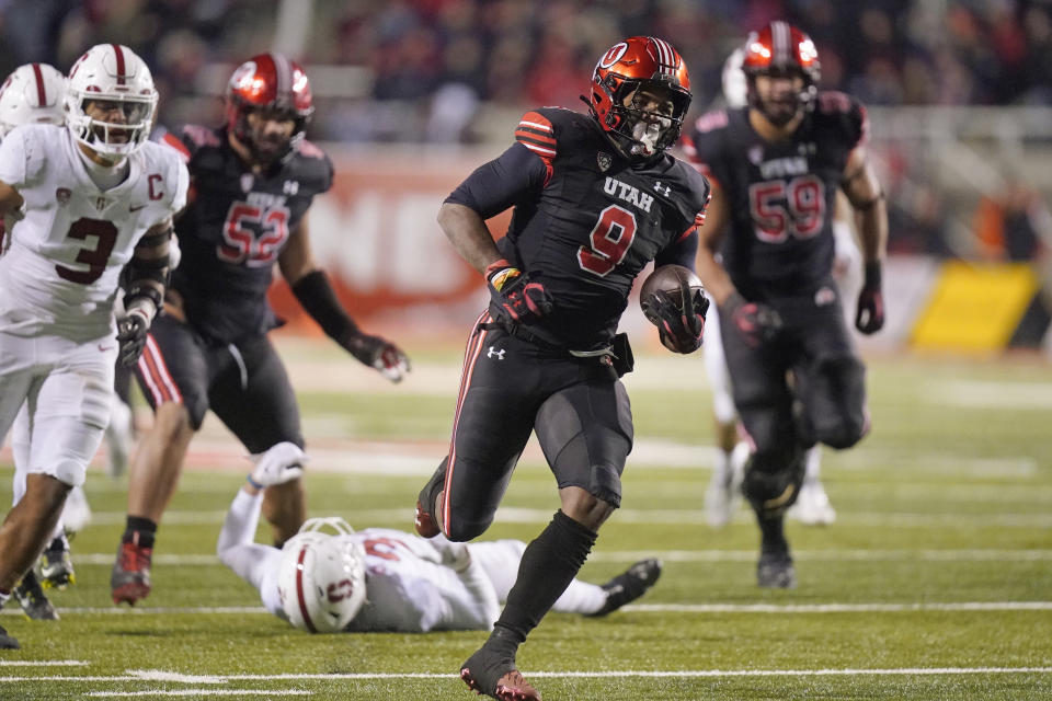 Utah running back Tavion Thomas (9) scores against Stanford during the second half of an NCAA college football game Saturday, Nov. 12, 2022, in Salt Lake City. (AP Photo/Rick Bowmer)