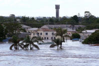 BUNDABERG, AUSTRALIA - JANUARY 29: North Bundaberg underwater as parts of southern Queensland experiences record flooding in the wake of Tropical Cyclone Oswald on January 29, 2013 in Bundaberg, Australia.Four deaths have been confirmed and thousands have been evacuated in Bundaberg as the city faces it's worst flood disaster in history. Rescue and evacuation missions continue today as emergency services prepare to move patients from Bundaberg Hospital to Brisbane amid fears the hospital could lose power. (Photo by Chris Hyde/Getty Images)