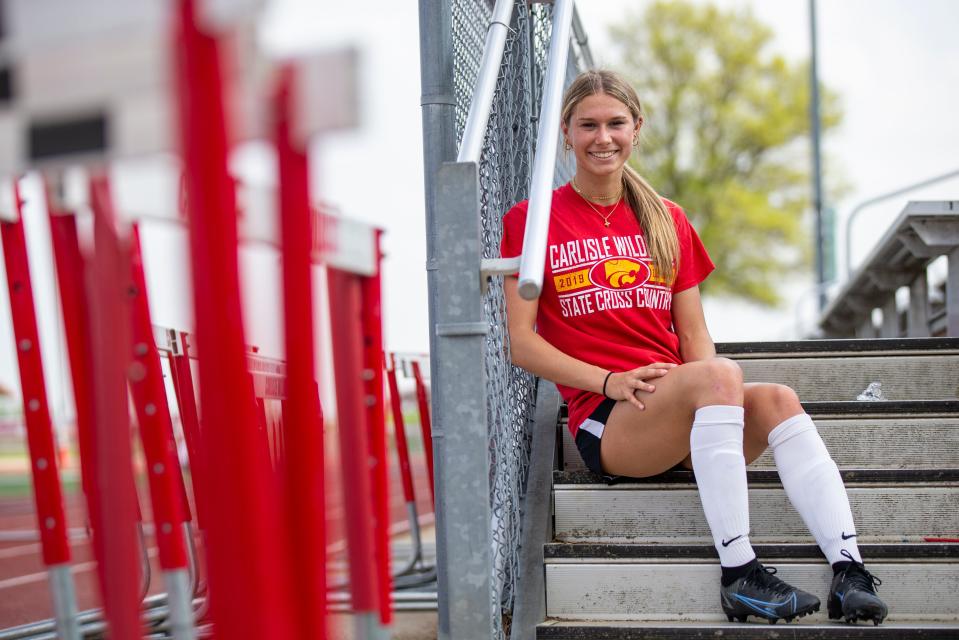 Carlisle senior Ainsley Erzen has become a star at soccer and track during the same seasons.