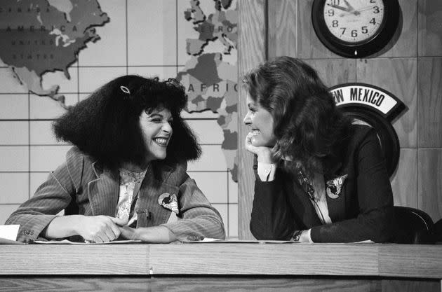 Gilda Radner as Roseanne Roseannadanna and Jane Curtin during the 'Weekend Update' skit on October 20, 1979. 