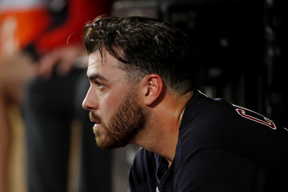 Cleveland Guardians starting pitcher Aaron Civale sits in the dugout after leaving the field in the fifth inning of a baseball game against the Minnesota Twins, Friday, May 13, 2022, in Minneapolis. (AP Photo/Bruce Kluckhohn)