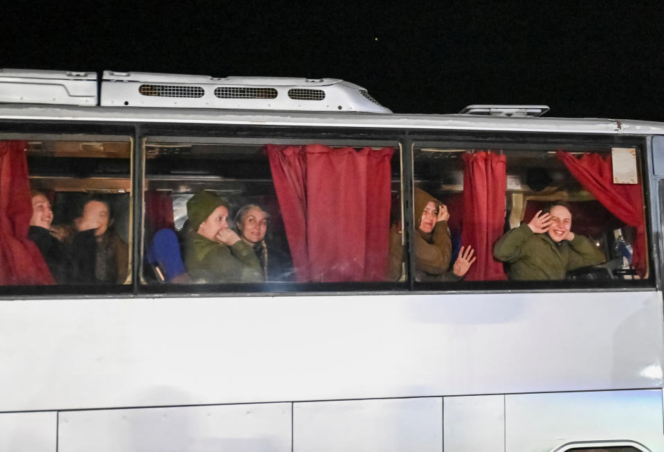 Ukrainian prisoners of war (POWs) look out of a bus window, amid Russia's attack on Ukraine, as they arrive in Zaporizhzhia, Ukraine October 17, 2022. REUTERS/Stringer