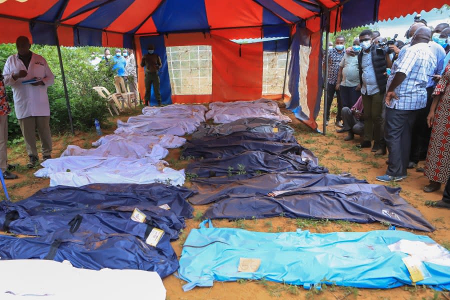 FILE – Body bags are laid out at the scene where dozens of bodies have been found in shallow graves in the village of Shakahola, near the coastal city of Malindi, in southern Kenya on April 24, 2023. Kenya’s top prosecutor on Tuesday ordered that 95 people from a doomsday cult be charged with murder, cruelty, child torture and other crimes in the deaths of 429 people believed to be members of the church. (AP Photo, File)