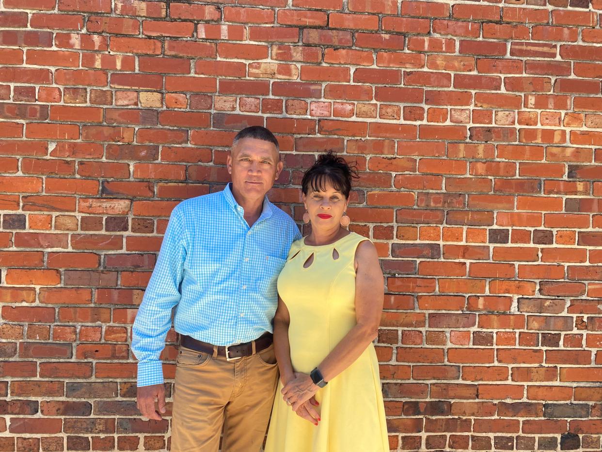 Anthony Dial, 55, (left) and Rhonda Dial, 55, pose for a photo in Lumberton, North Carolina. The pair has lived in Robeson County their entire lives.