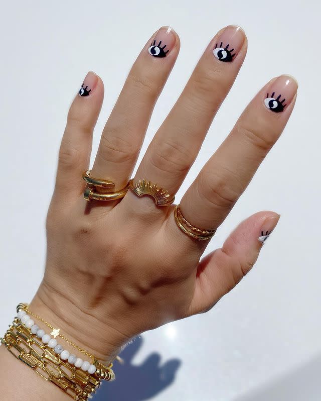 <p>When you're working on tiny designs with two starkly different colors, <strong>allow your <a href="https://www.cosmopolitan.com/style-beauty/beauty/g26135671/nail-polish-brands/" rel="nofollow noopener" target="_blank" data-ylk="slk:nail polishes;elm:context_link;itc:0;sec:content-canvas" class="link ">nail polishes</a> ample time to dry</strong> before layering them so you don't end up with muddy gray blobs.</p><p><a href="https://www.instagram.com/p/CBqWmgOnbgX/?utm_source=ig_embed&utm_campaign=loading" rel="nofollow noopener" target="_blank" data-ylk="slk:See the original post on Instagram;elm:context_link;itc:0;sec:content-canvas" class="link ">See the original post on Instagram</a></p>